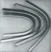 Brittle alloy bars bent in Hasted's experiment